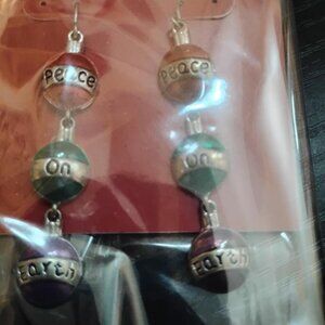 Ornament Dangle Earrings. NWT. Has "Peace on Earth" om Ornaments. Hook Back.